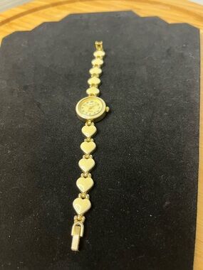 171 Ronica Women's
Quartz Wristwatch with Heart Accents